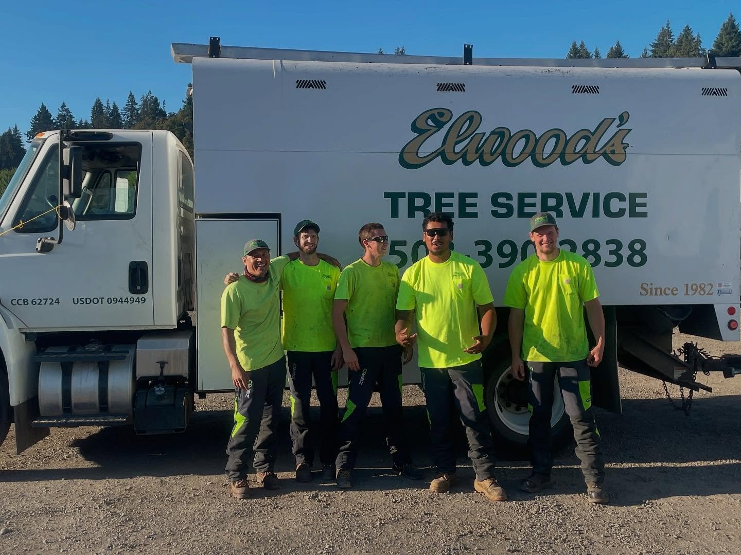 Current Elwood's Tree Service crew with their service truck